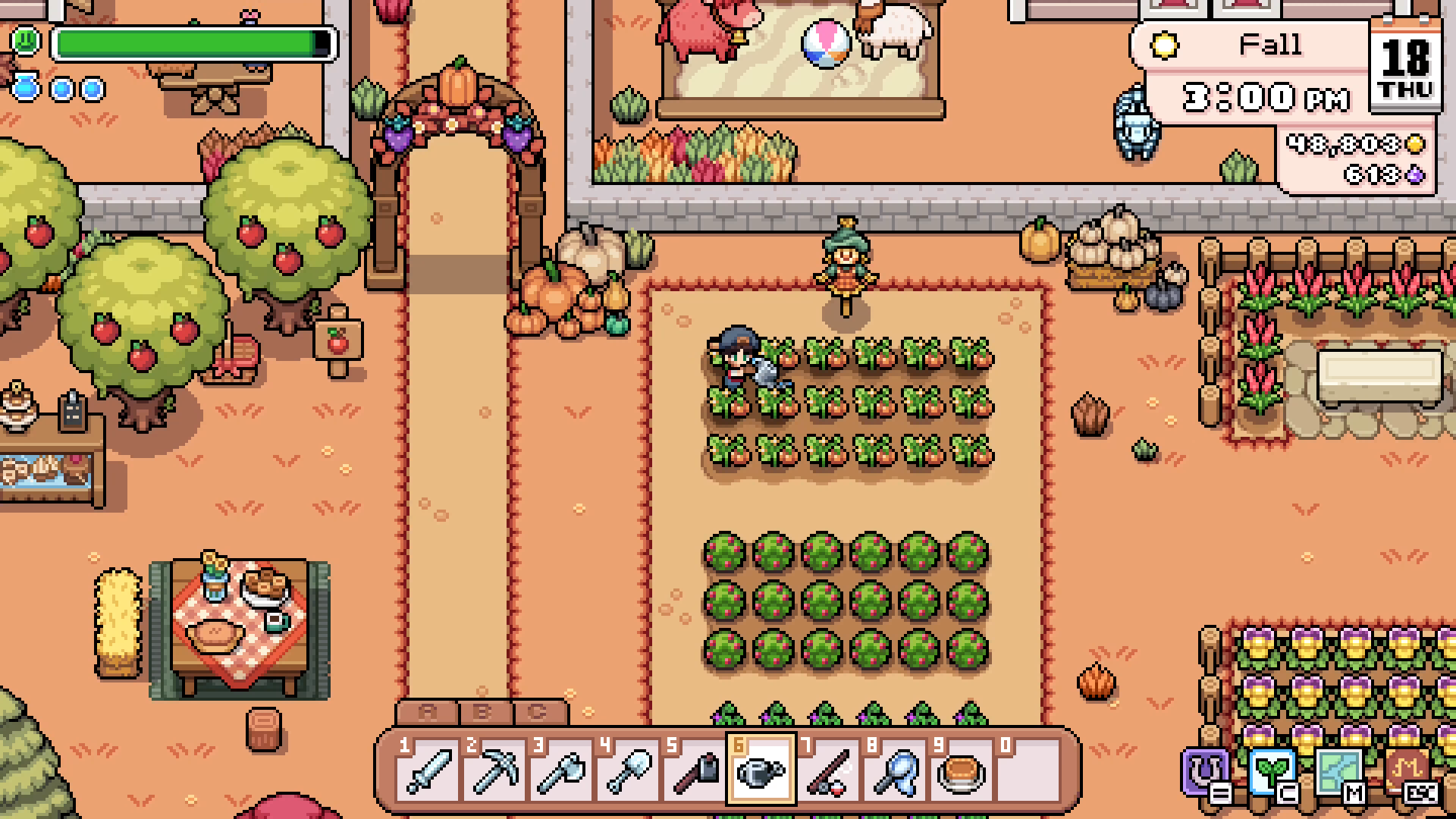 Player watering an autumn crop field beside farm animals