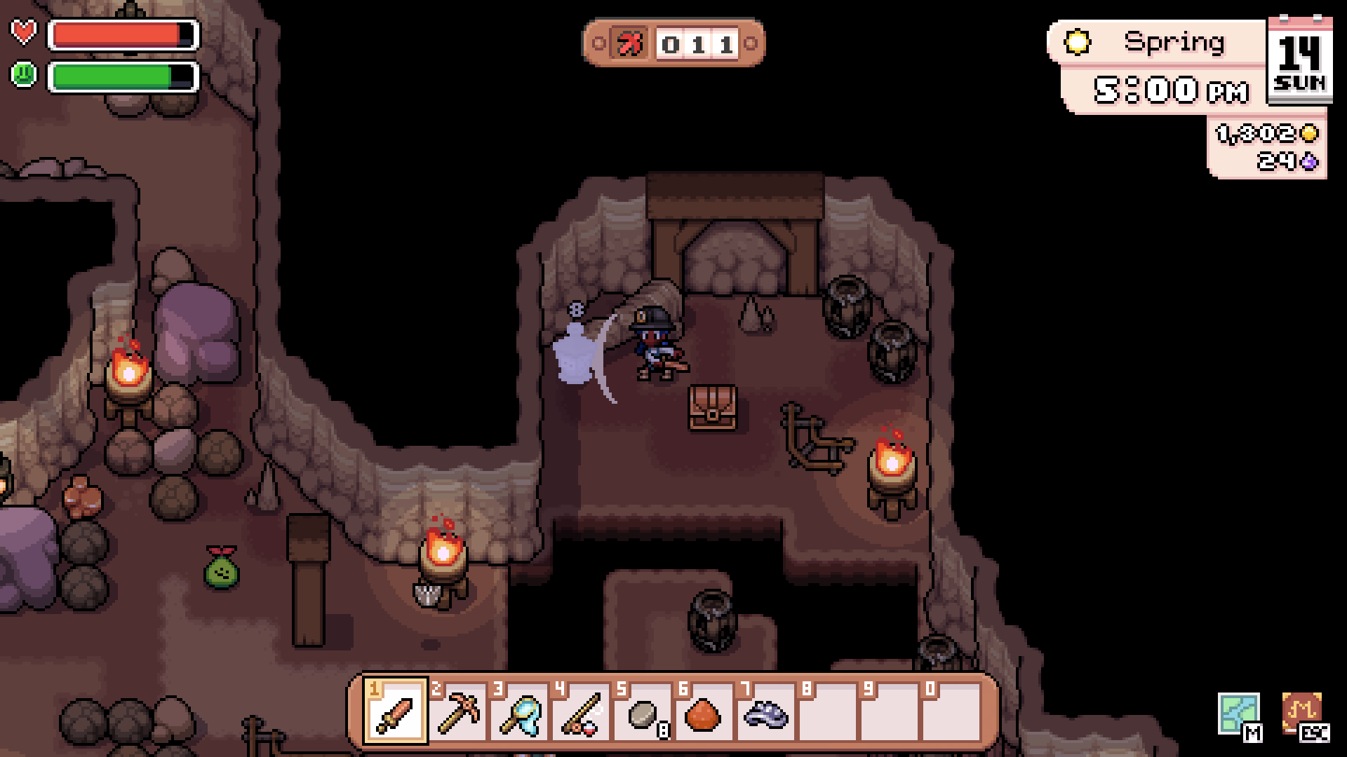 Player battling monsters in the Mines in Fields of Mistria