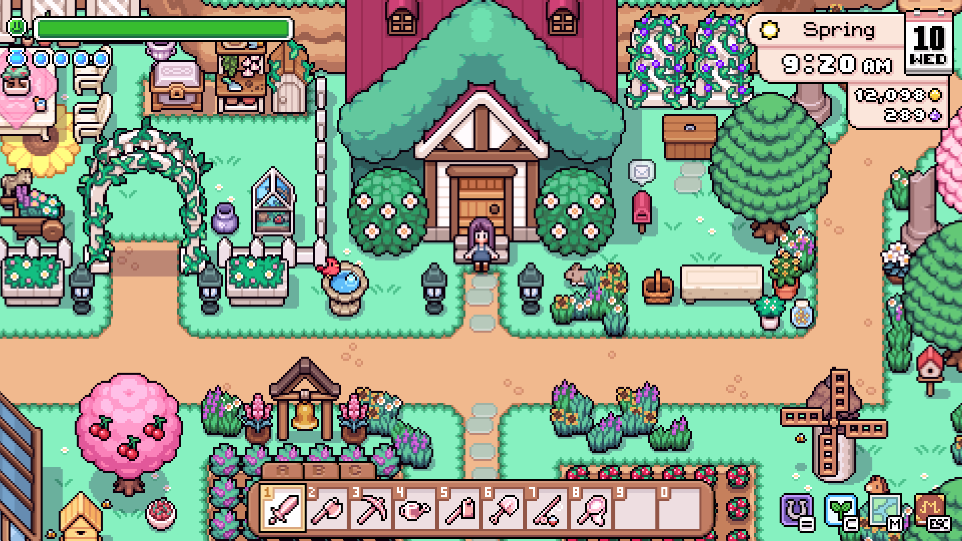 Player walking through a flower-lined Mistria plaza beside a market stall